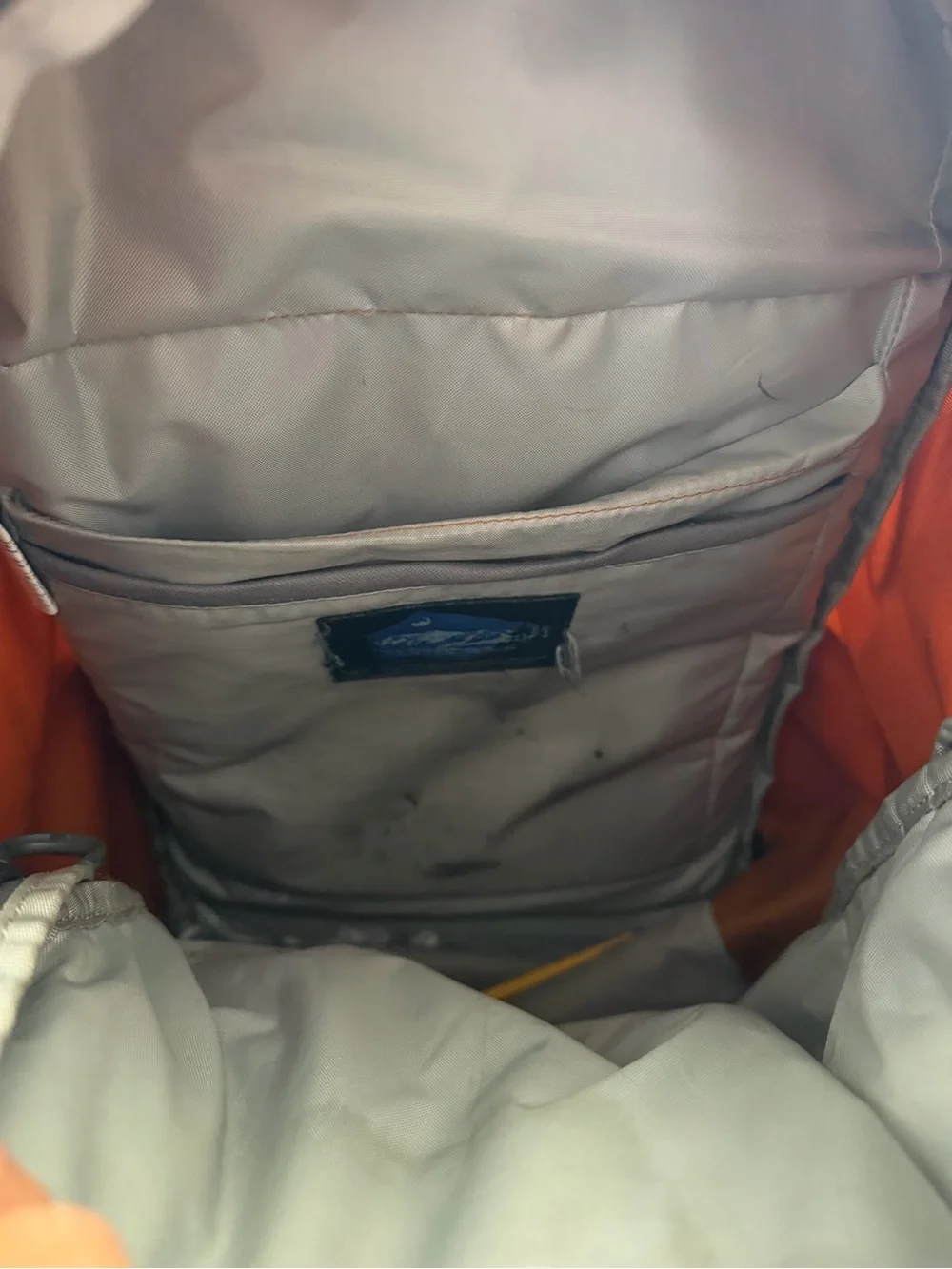 OSPREY Men's Backpack in Burnt Orange with Gray Pattern, limited edition